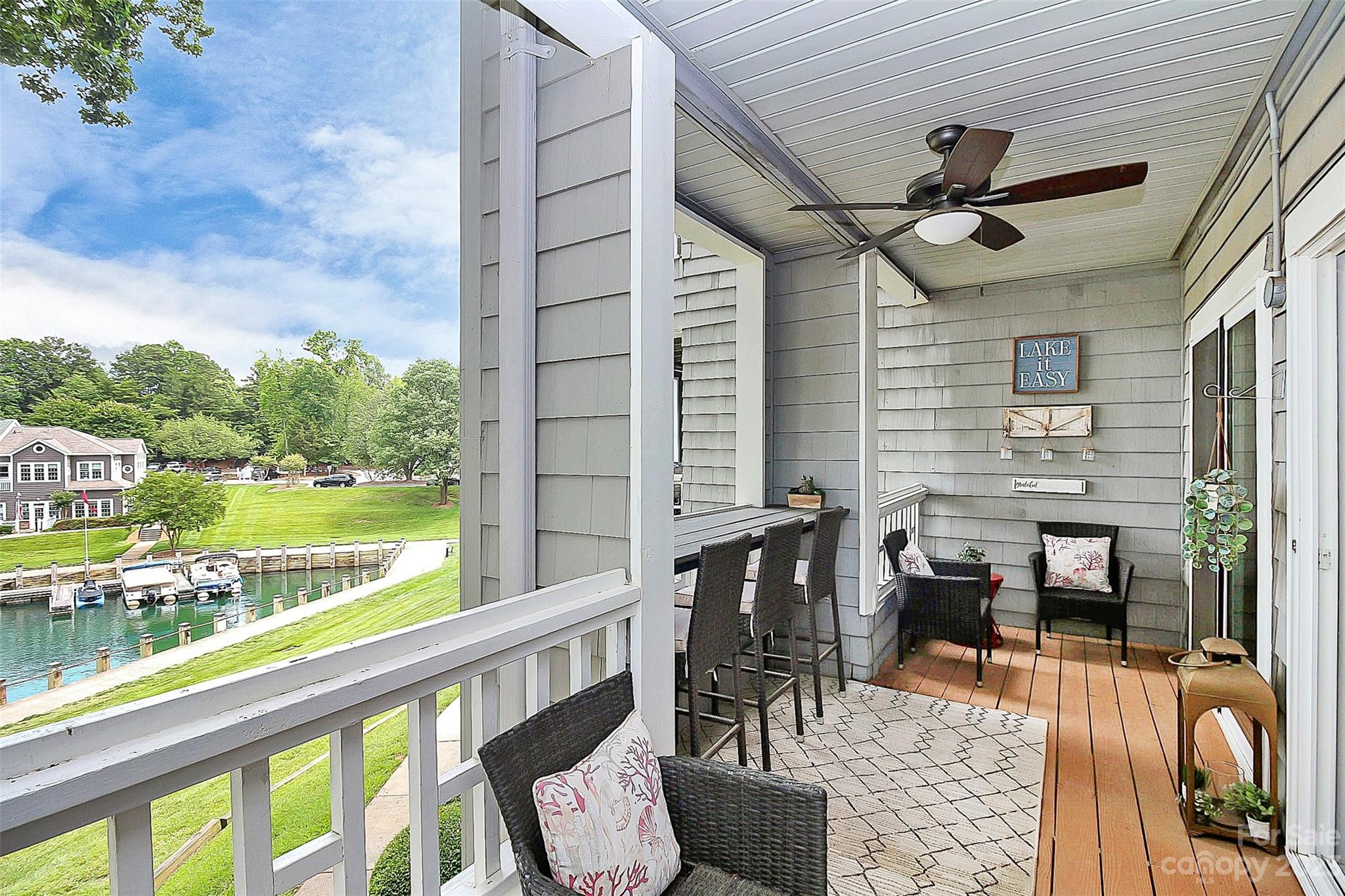 a view of a balcony with chairs