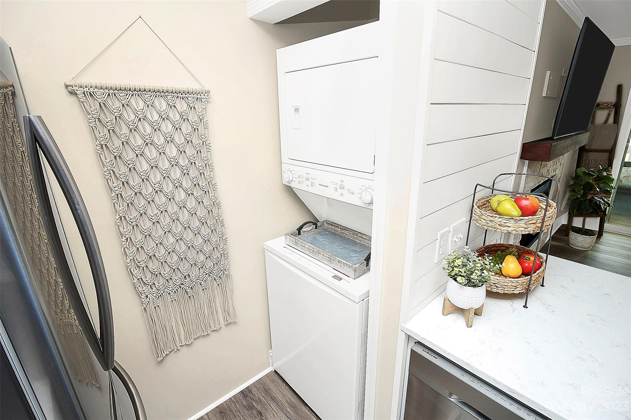205 Northwest Drive, Unit 38 Davidson, NC 28036 - Photo 16 of 32 storage and utility room with wooden floor