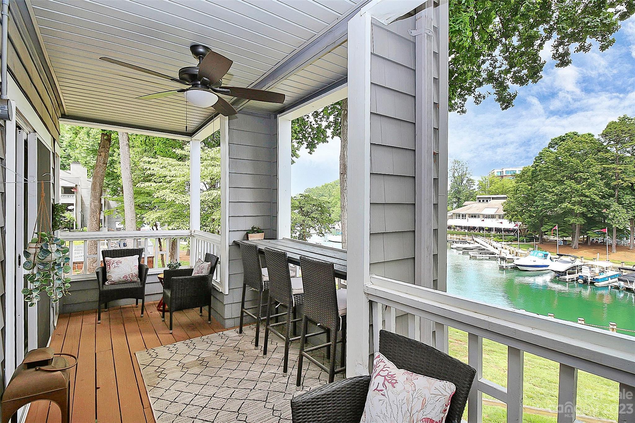 205 Northwest Drive, Unit 38 Davidson, NC 28036 - Photo 2 of 32 a view of a dining room with furniture window and outside view