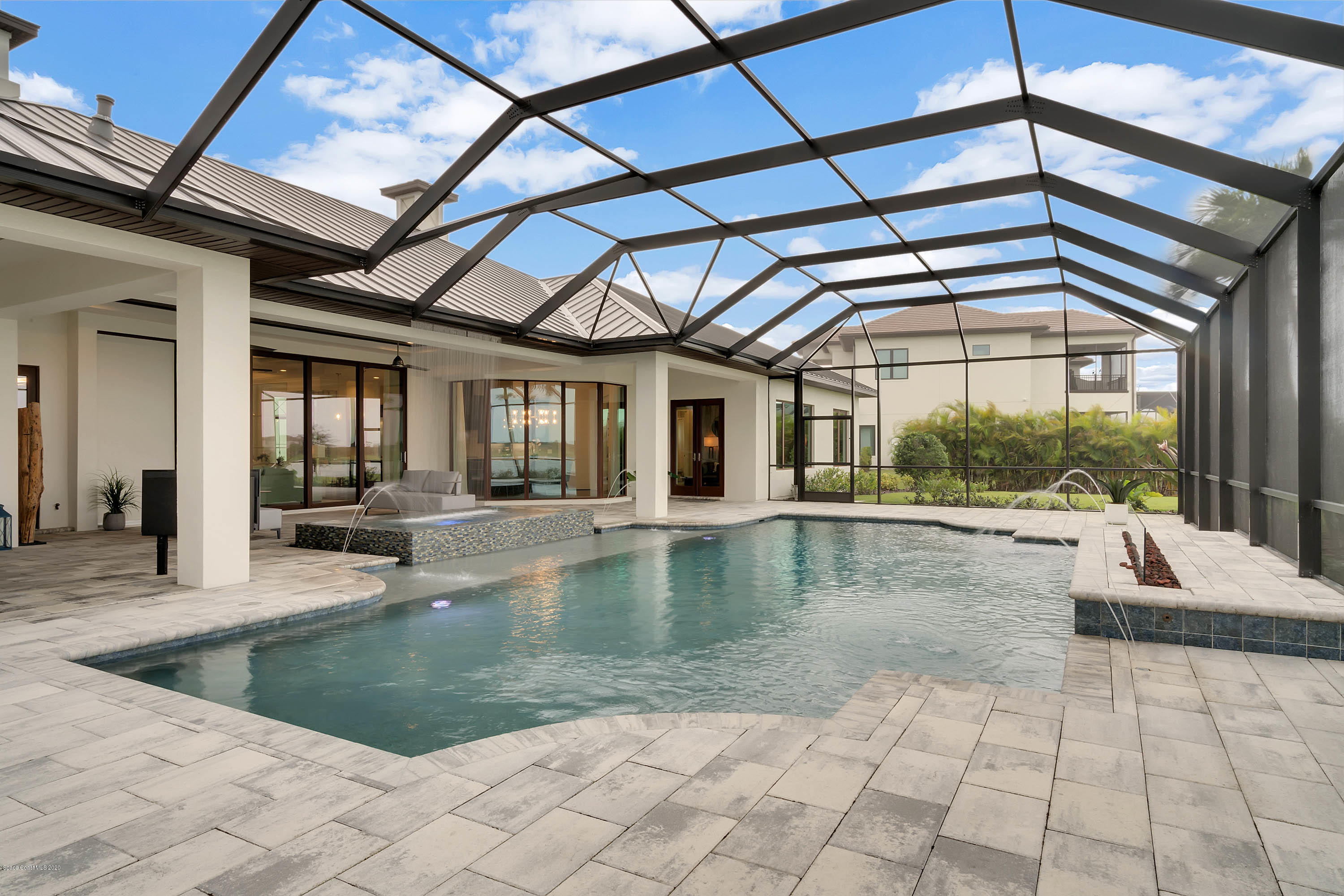 4533 Milost Drive Rockledge, FL 32955 - Photo 19 of 49 a view of indoor pool and sitting area