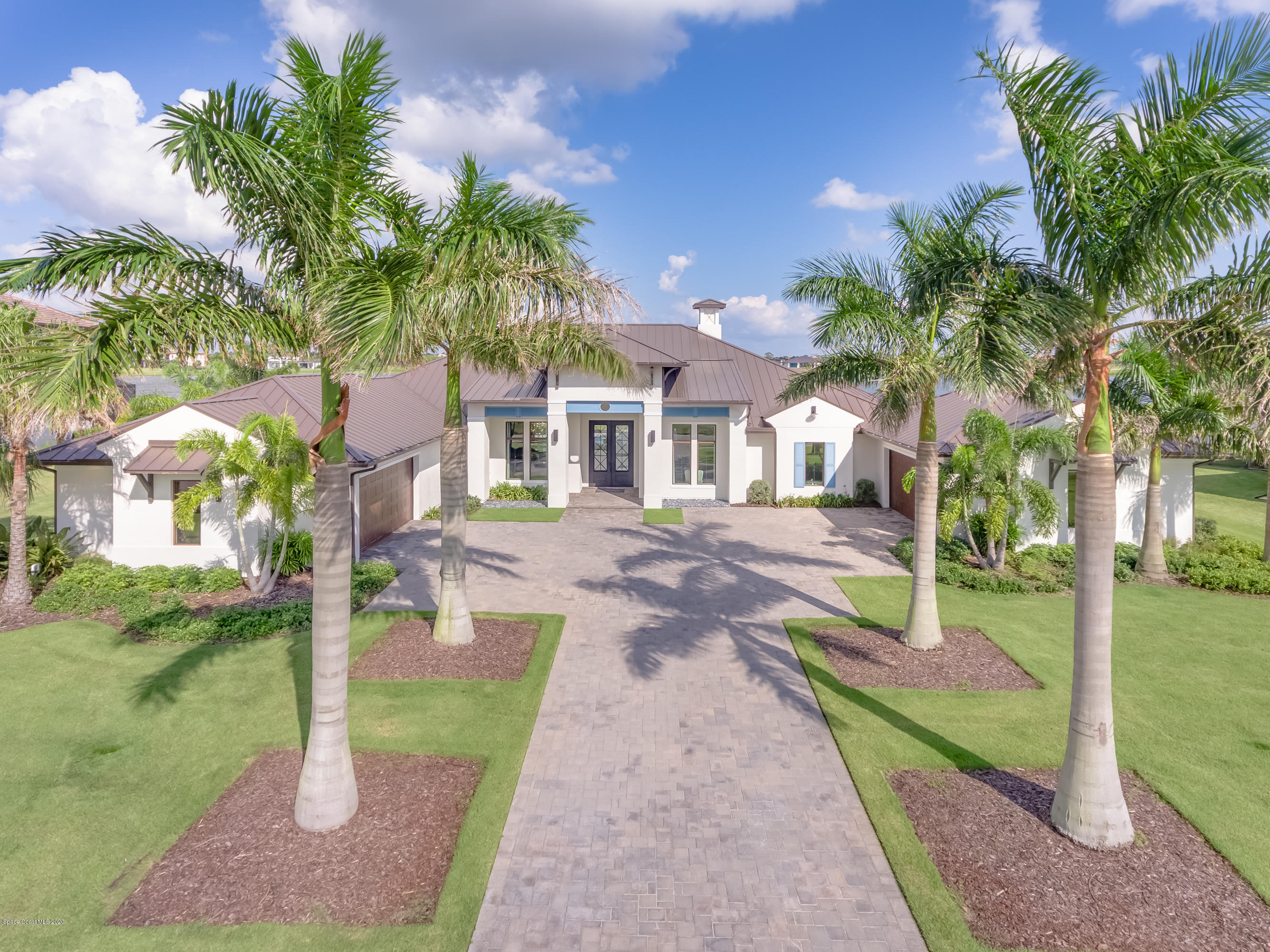 4533 Milost Drive Rockledge, FL 32955 - Photo 3 of 49 a front view of a house with a yard and tree