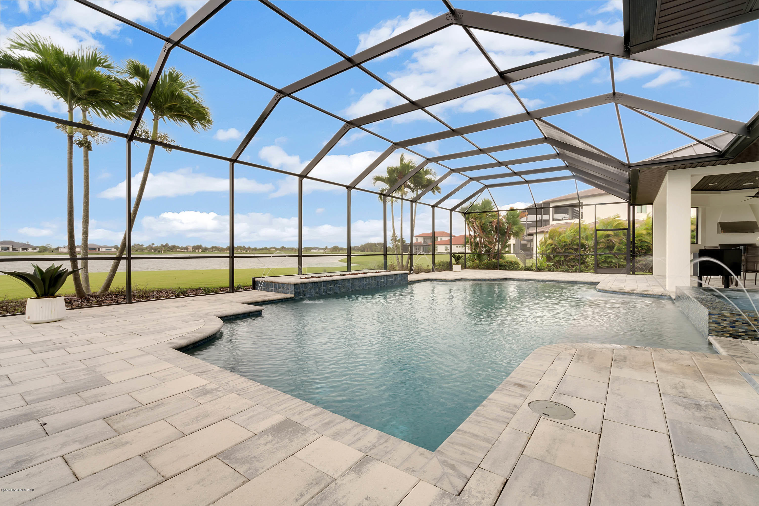 4533 Milost Drive Rockledge, FL 32955 - Photo 21 of 49 a view of a swimming pool with a lounge chair