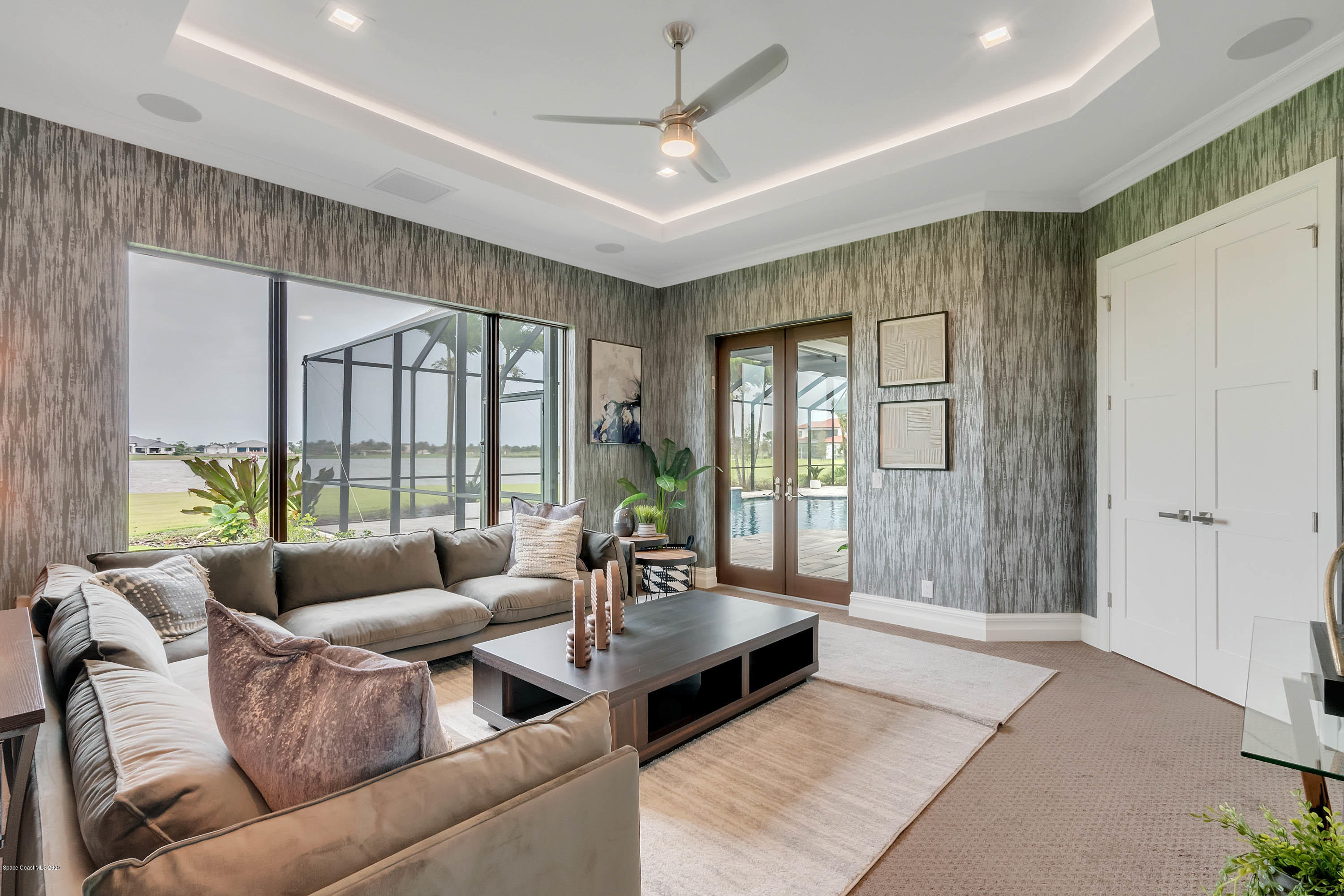 4533 Milost Drive Rockledge, FL 32955 - Photo 25 of 49 a living room with furniture and a large window