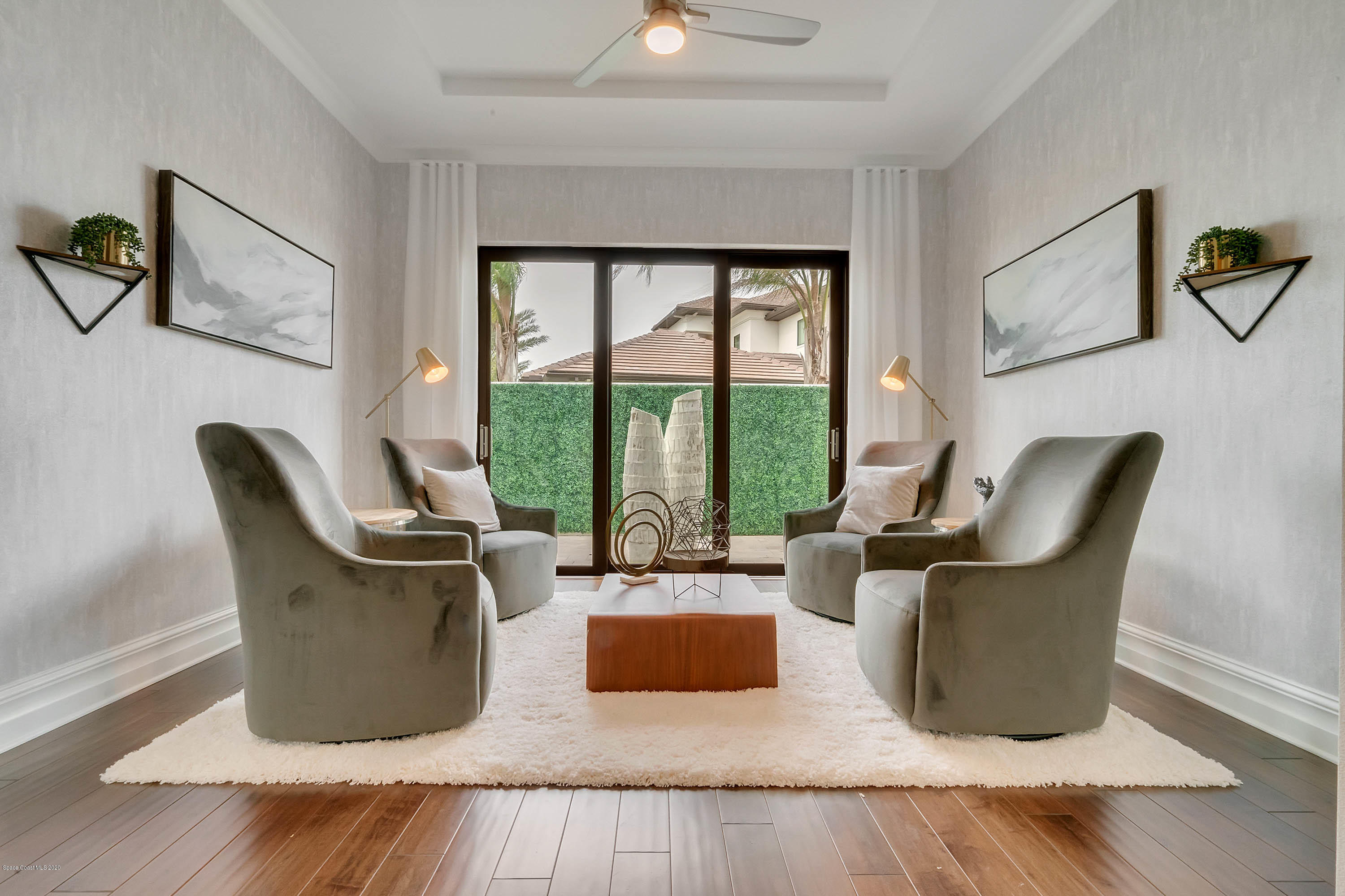 4533 Milost Drive Rockledge, FL 32955 - Photo 27 of 49 a living room with furniture and a large window