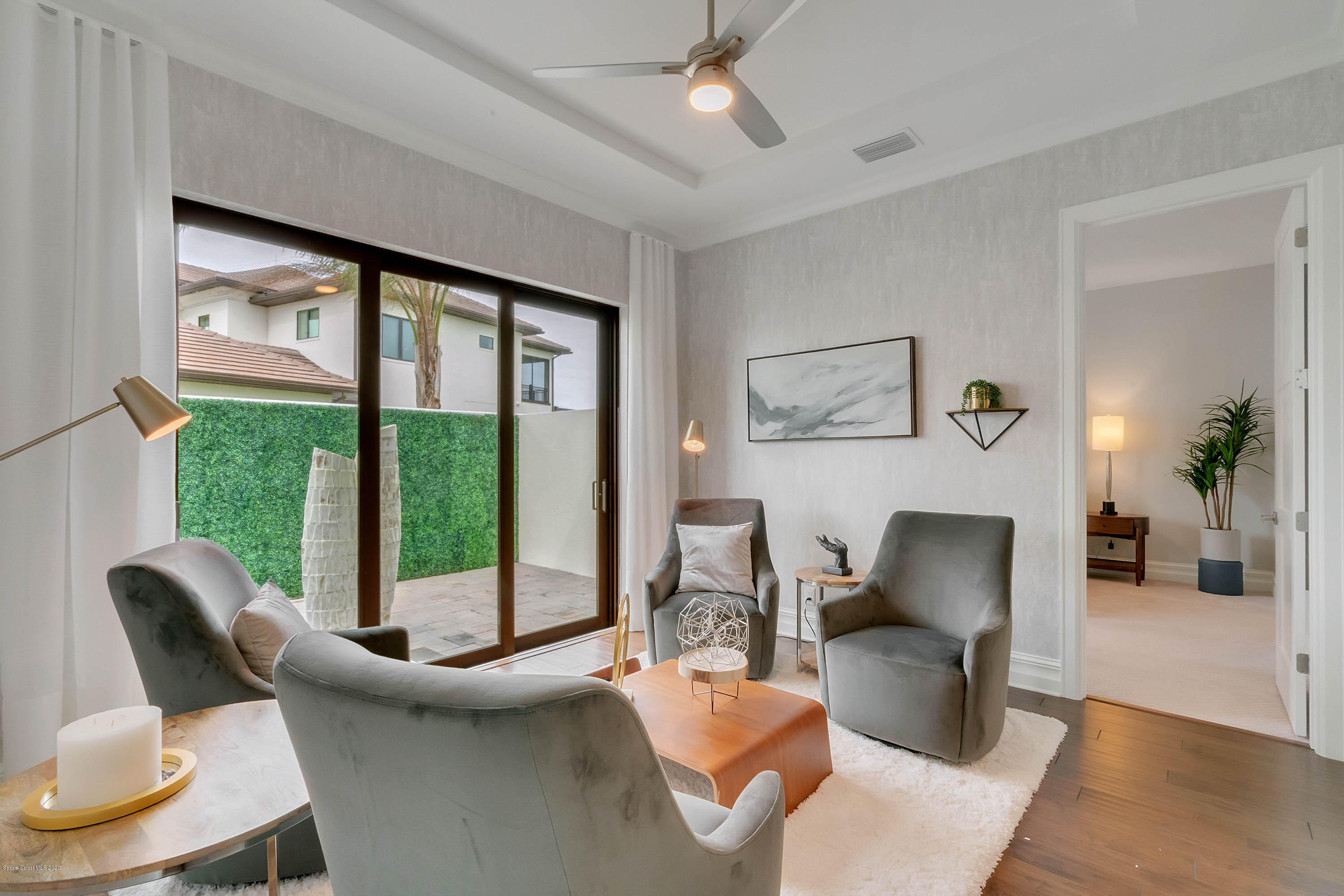 4533 Milost Drive Rockledge, FL 32955 - Photo 28 of 49 a view of a livingroom with furniture and a large window