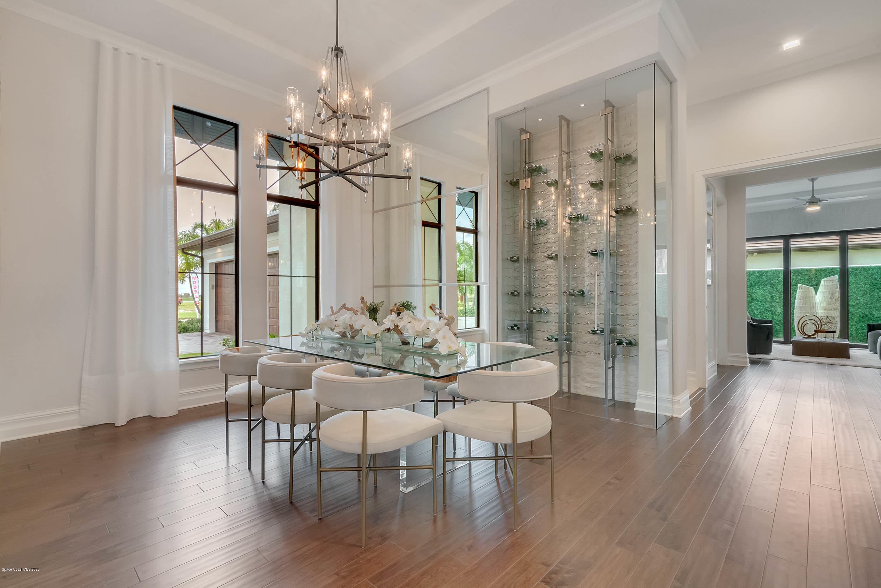 4533 Milost Drive Rockledge, FL 32955 - Photo 31 of 49 a view of a dining room with furniture window and wooden floor