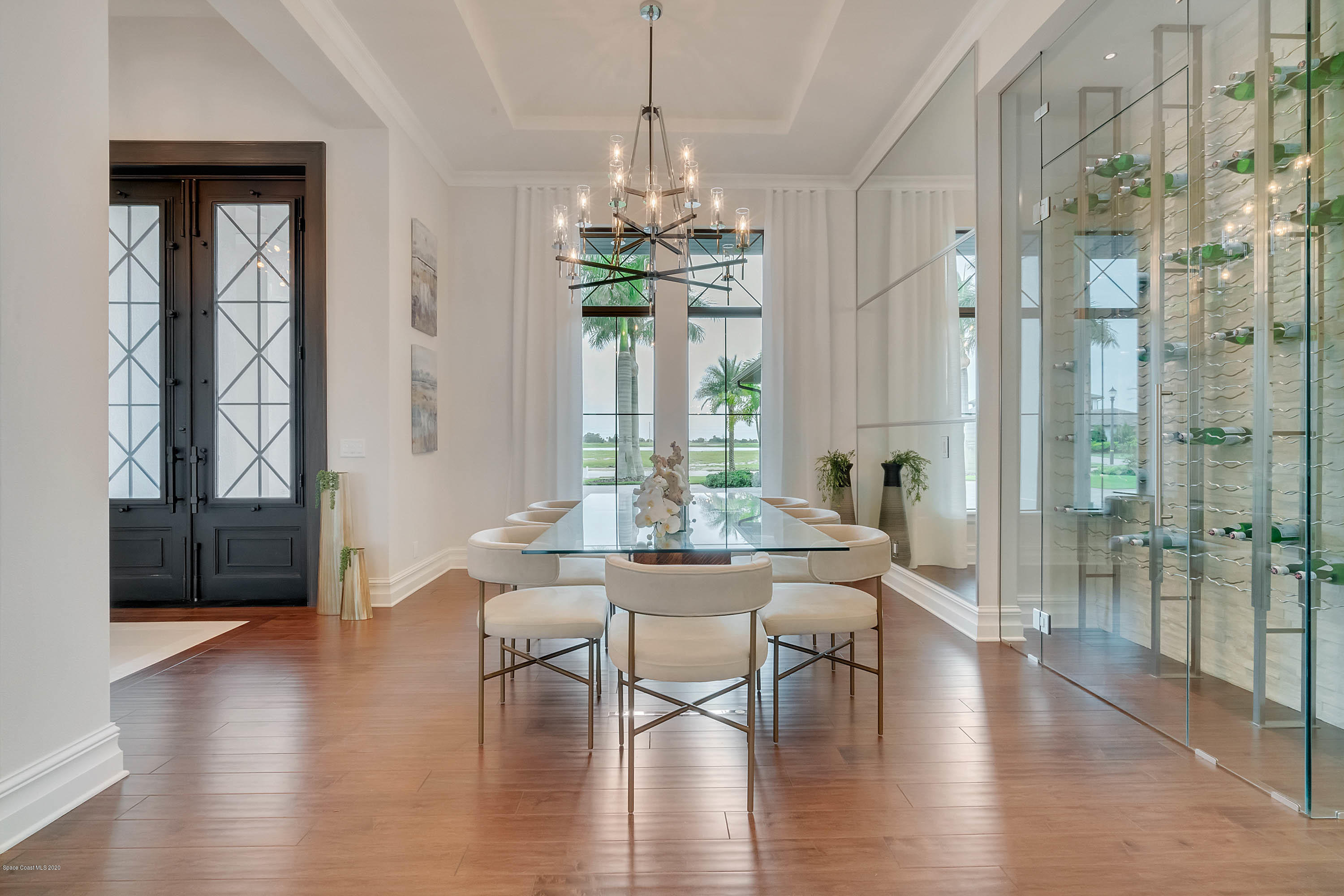4533 Milost Drive Rockledge, FL 32955 - Photo 32 of 49 a view of a dining room with furniture window and wooden floor