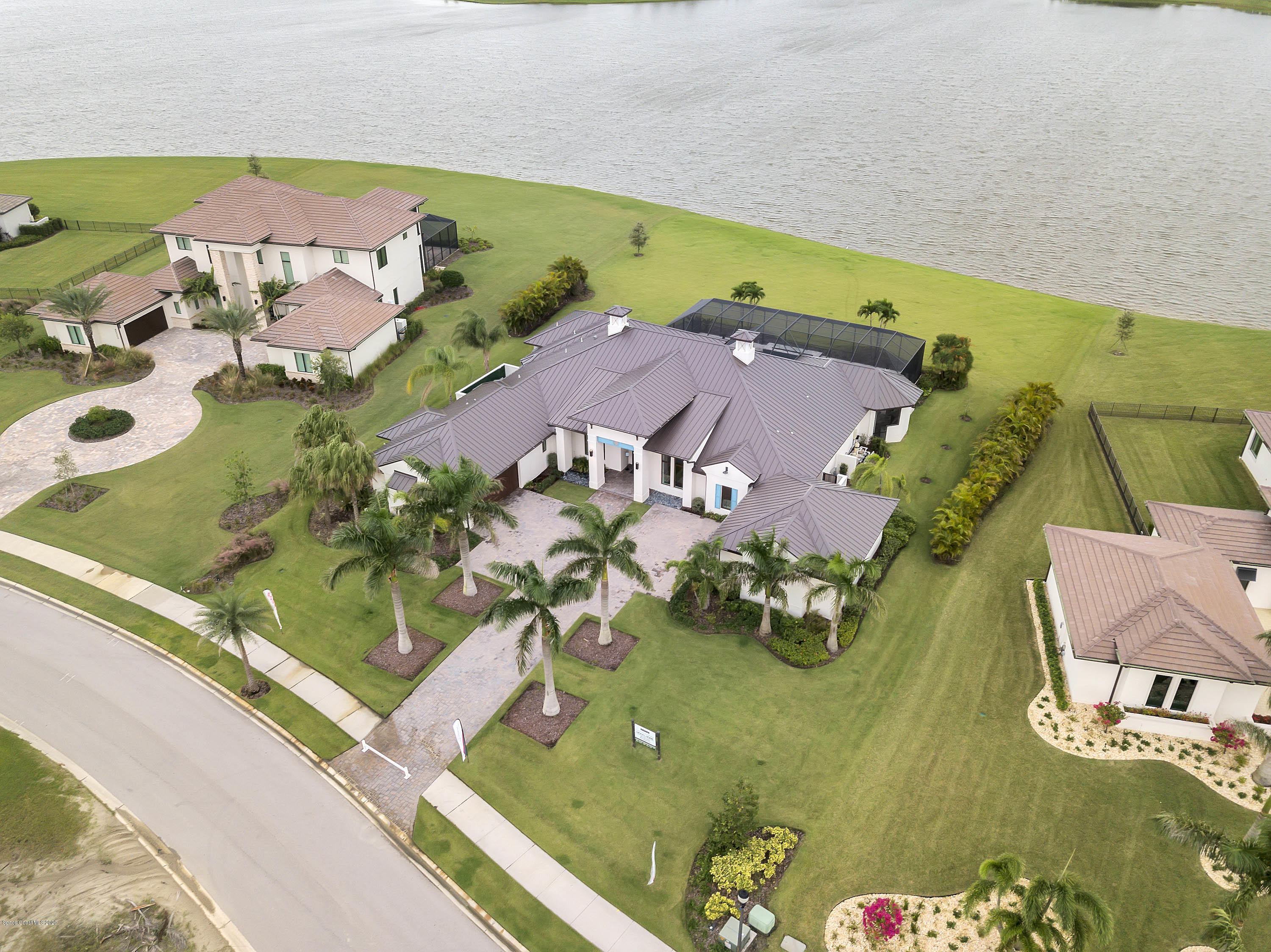 4533 Milost Drive Rockledge, FL 32955 - Photo 45 of 49 an aerial view of a pool patio swimming pool and outdoor seating