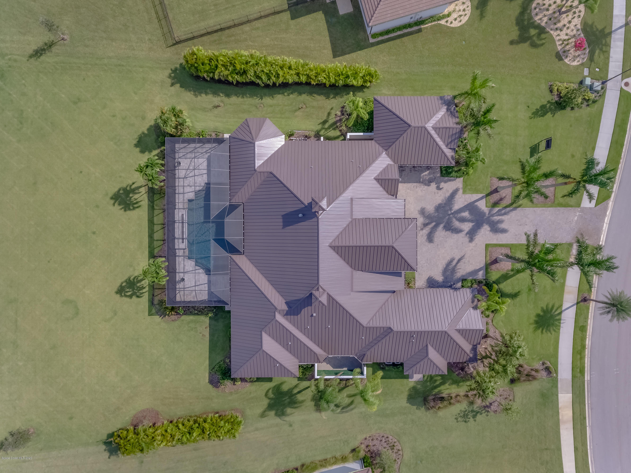 4533 Milost Drive Rockledge, FL 32955 - Photo 47 of 49 an aerial view of a house with outdoor space and a lake view