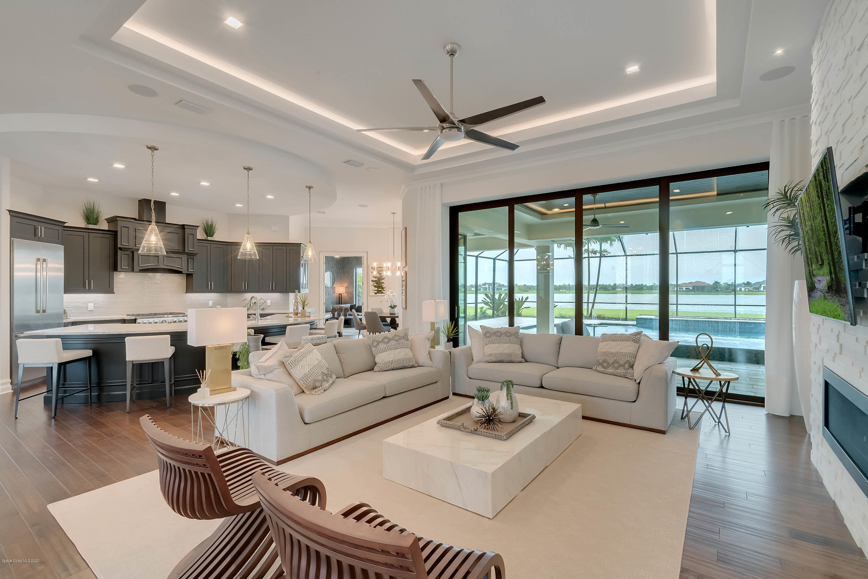 4533 Milost Drive Rockledge, FL 32955 - Photo 9 of 49 a living room with furniture and a large window