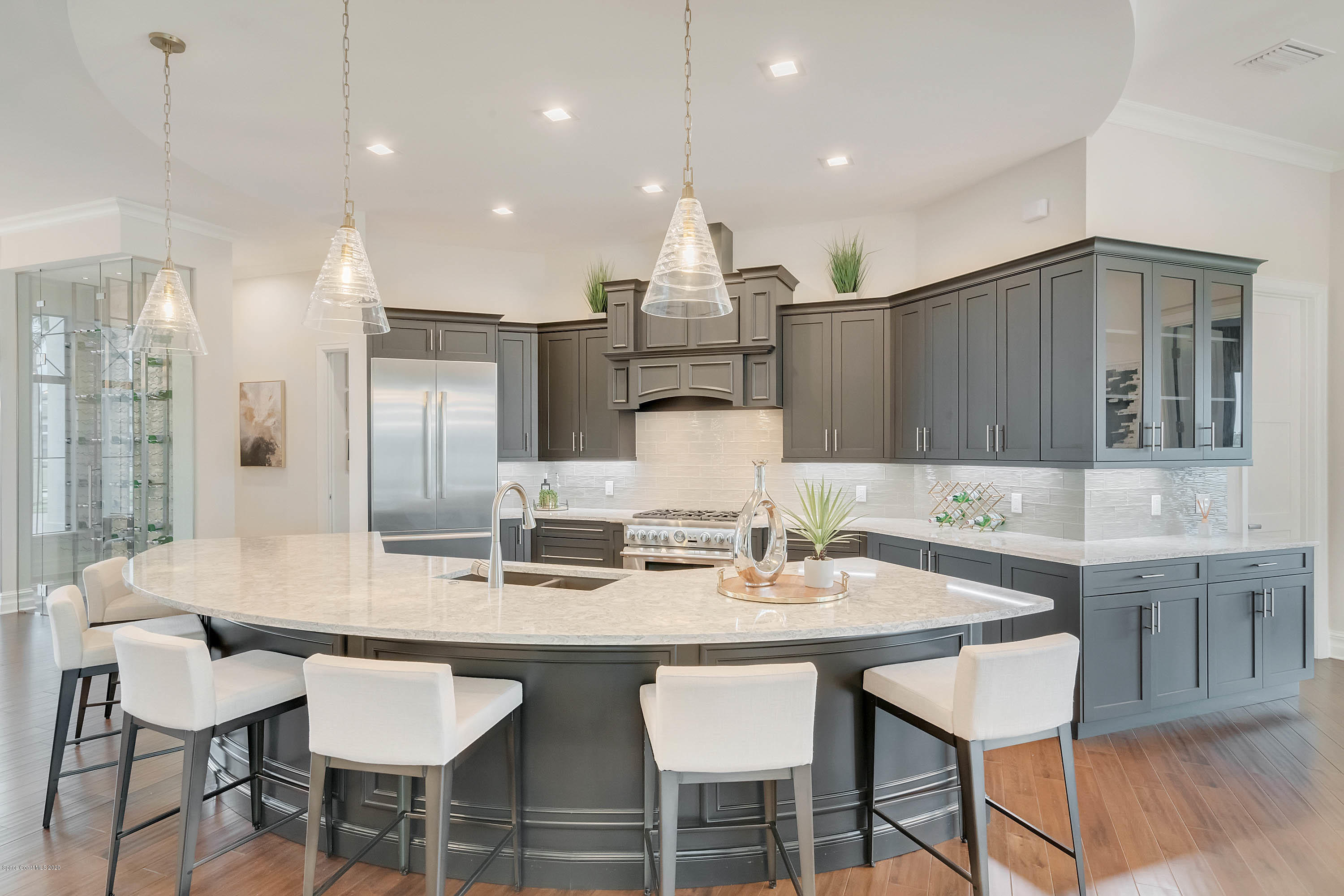 4533 Milost Drive Rockledge, FL 32955 - Photo 10 of 49 a large kitchen with a table and chairs