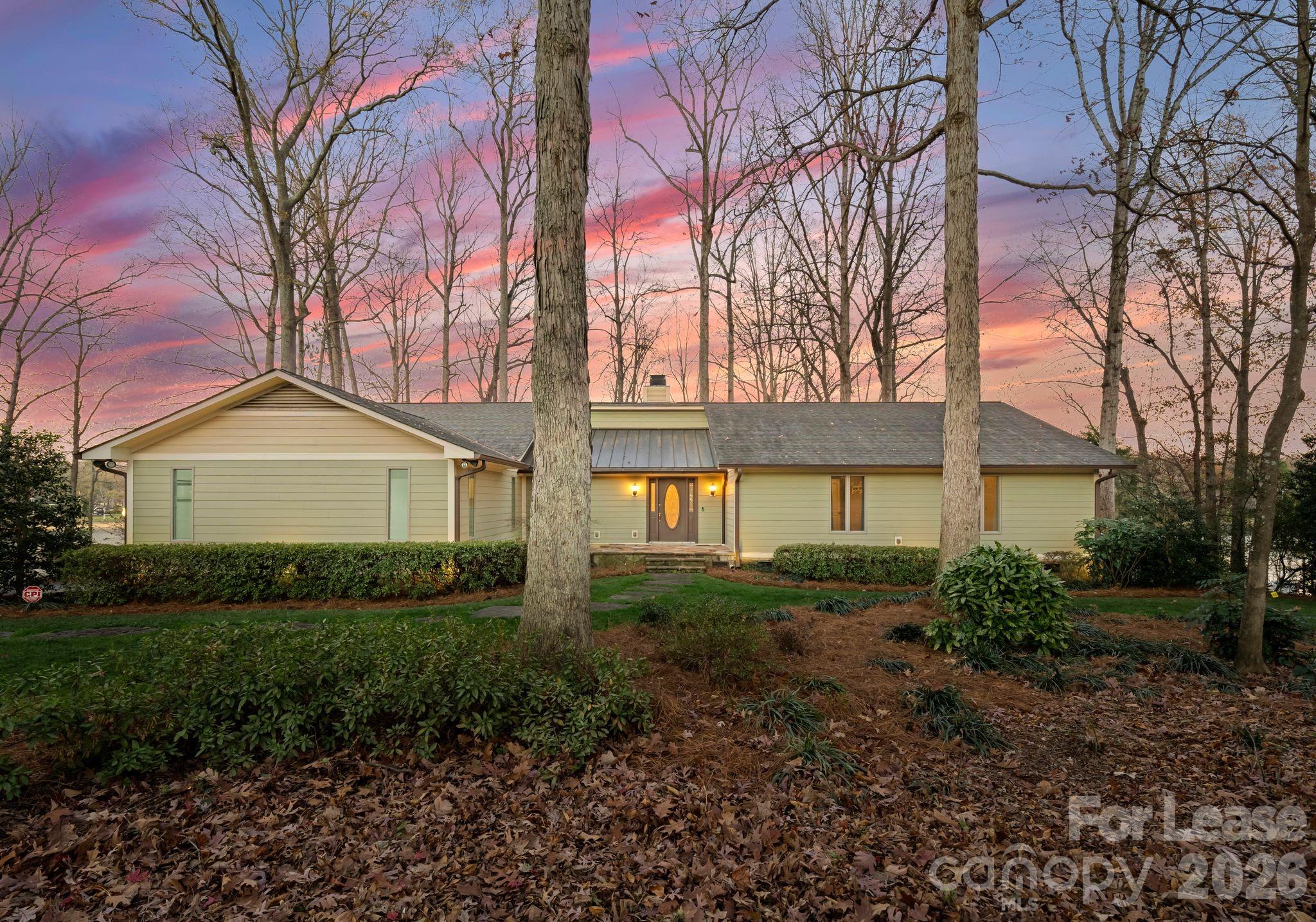 19709 Stough Farm Road Cornelius, NC 28031 - Photo 2 of 48 a view of a house with a yard and plants