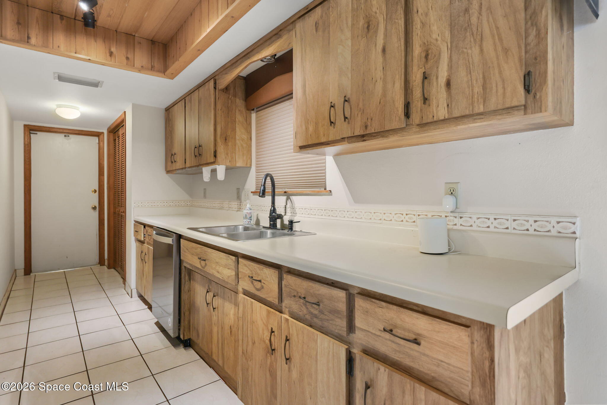 7256 Bright Avenue Cocoa, FL 32927 - Photo 8 of 29 Kitchen overlooking pool