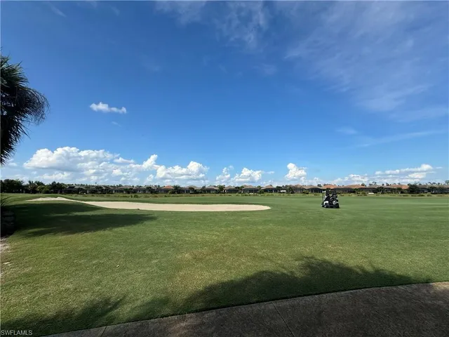 a view of a lake from a yard
