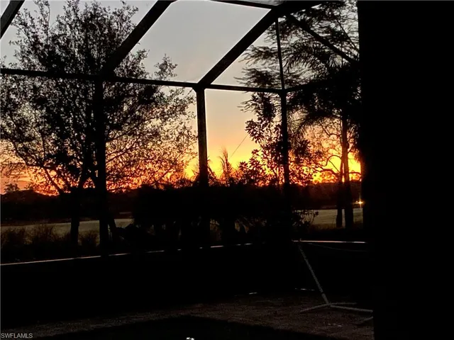 a view of a yard from a balcony