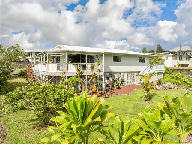 a view of a house with a garden