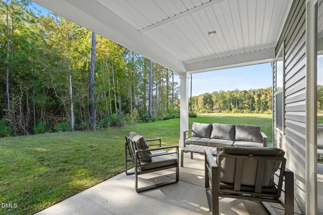 a view of a patio with backyard