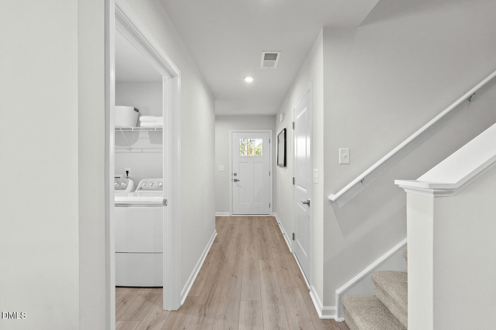 3894 Moth Lane Bailey, NC 27807 - Photo 21 of 23 a view of a hallway with wooden floor and staircase