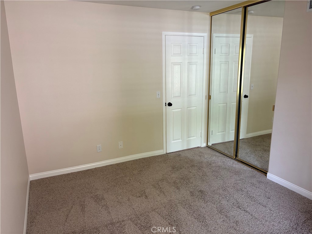 28999 Clear Spring Lane Highland, CA 92346 - Photo 14 of 32 Bedroom 1 Mirrored Closet Doors