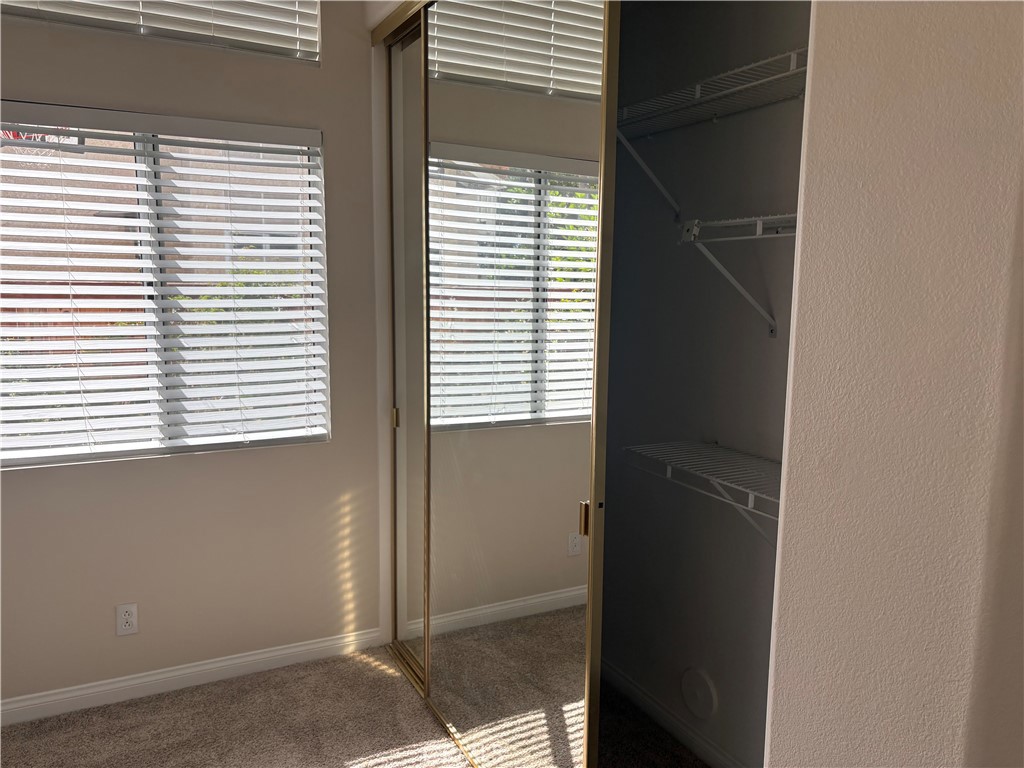 28999 Clear Spring Lane Highland, CA 92346 - Photo 19 of 32 Primary Bedroom Closet 1 with Mirrored Doors