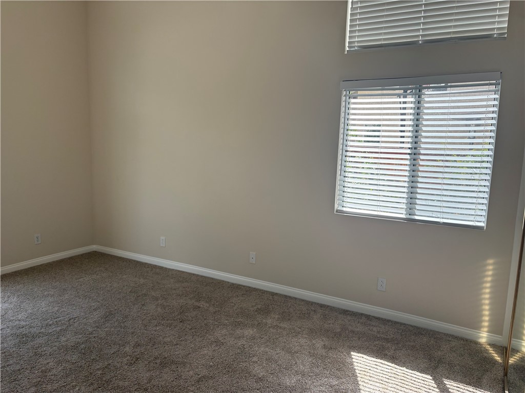 28999 Clear Spring Lane Highland, CA 92346 - Photo 20 of 32 Primary Bedroom high ceilings