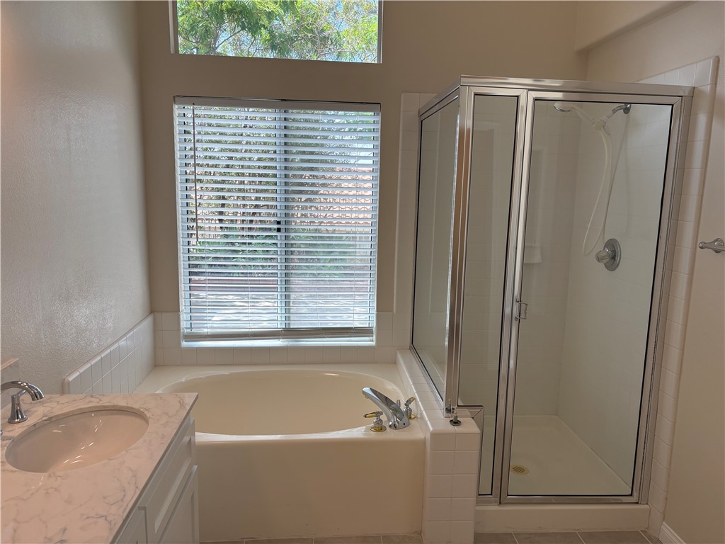28999 Clear Spring Lane Highland, CA 92346 - Photo 26 of 32 Primary Bathroom with tub and separate shower
