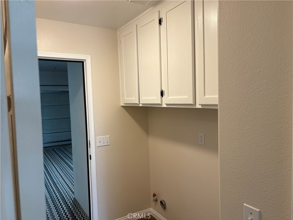 28999 Clear Spring Lane Highland, CA 92346 - Photo 28 of 32 Hall Laundry Area looking into Garage
