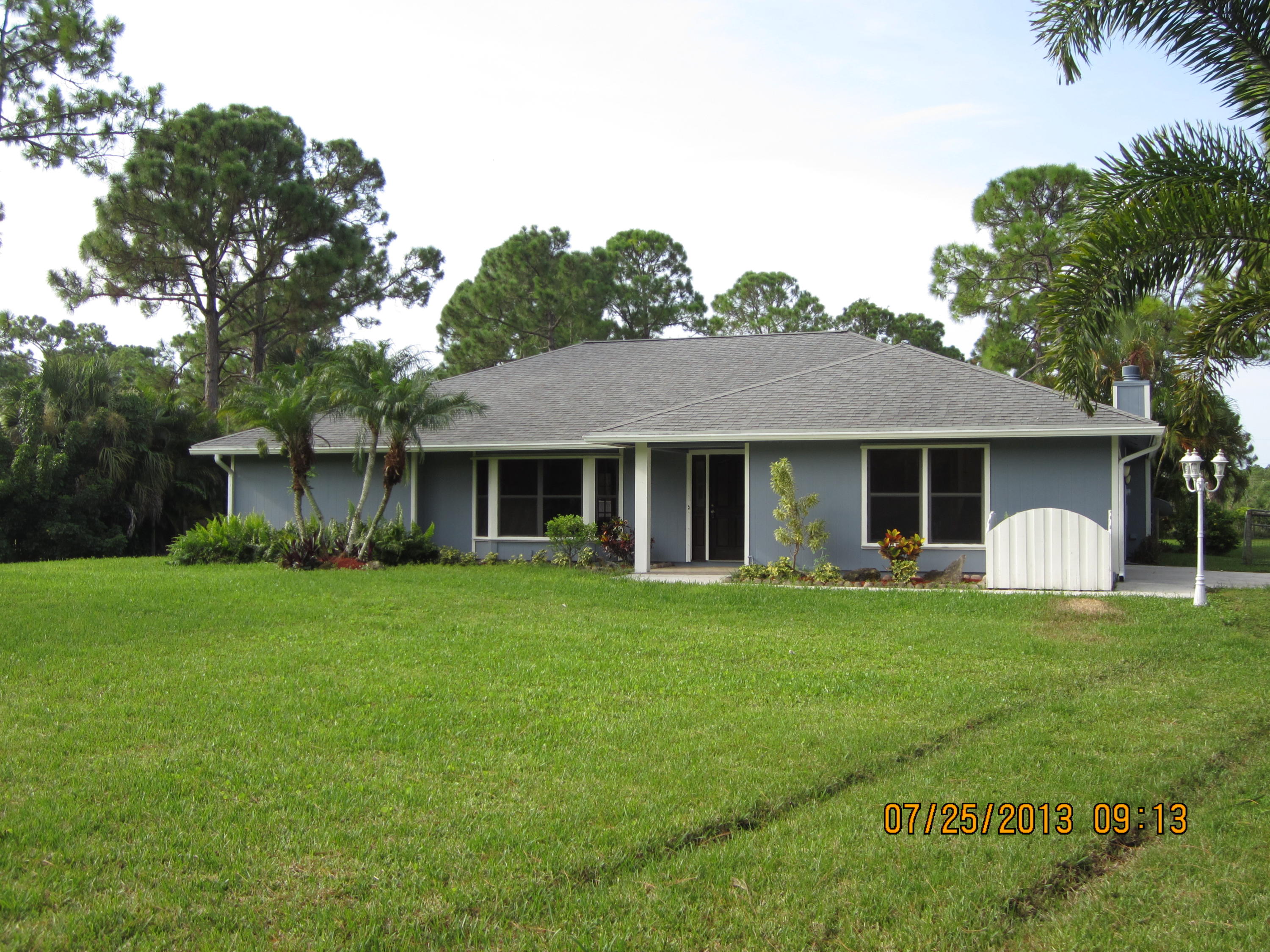10976 Sandy Run Road Jupiter, FL 33478 - Photo 1 of 11 Exterior Front
