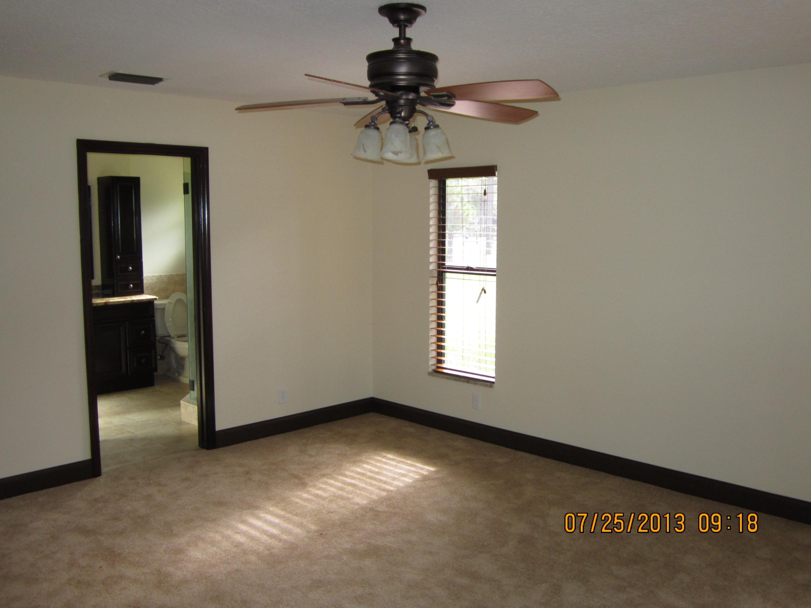 10976 Sandy Run Road Jupiter, FL 33478 - Photo 6 of 11 Master Bedroom