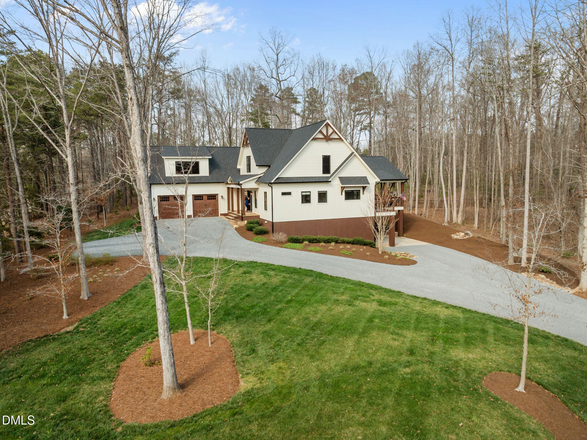6450 Moores Mill Road Rougemont, NC 27572 - Photo 1 of 66 a front view of a house with a yard