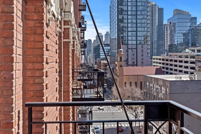 a bathroom with a sink mirror and toilet