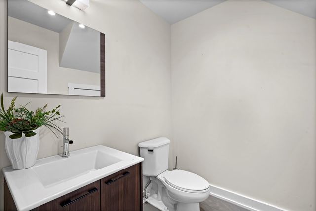 a view of open kitchen with furniture and a window