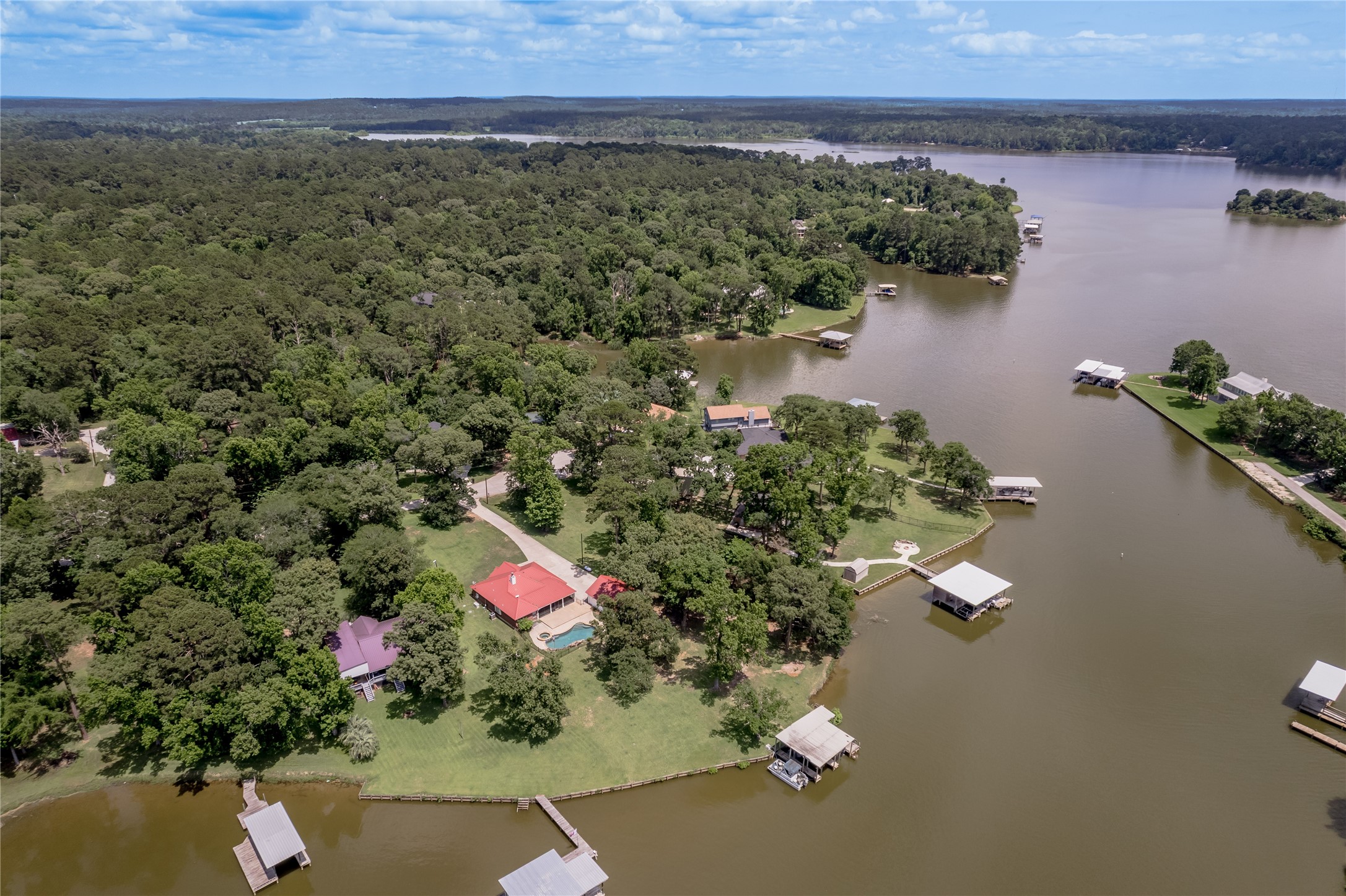324 Red Oak Lane Trinity, TX 75862 - Photo 48 of 49 an aerial view of a house with a yard and lake view