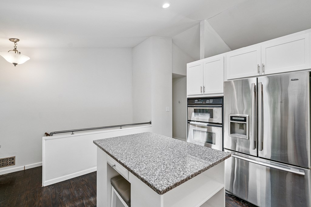 5055 Wright Bridge Road Cumming, GA 30028 - Photo 11 of 39 a kitchen with a refrigerator and a sink