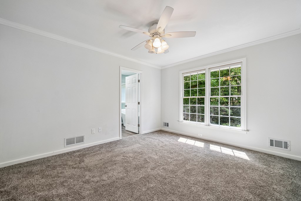 5055 Wright Bridge Road Cumming, GA 30028 - Photo 16 of 39 a view of an empty room with a window