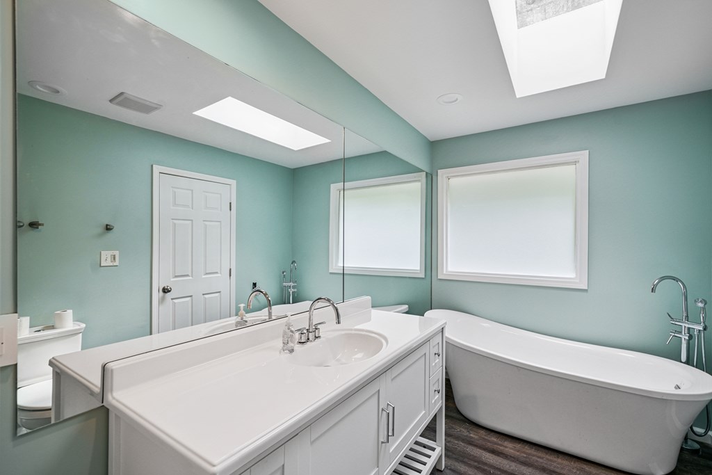 5055 Wright Bridge Road Cumming, GA 30028 - Photo 17 of 39 a bathroom with a sink and a mirror