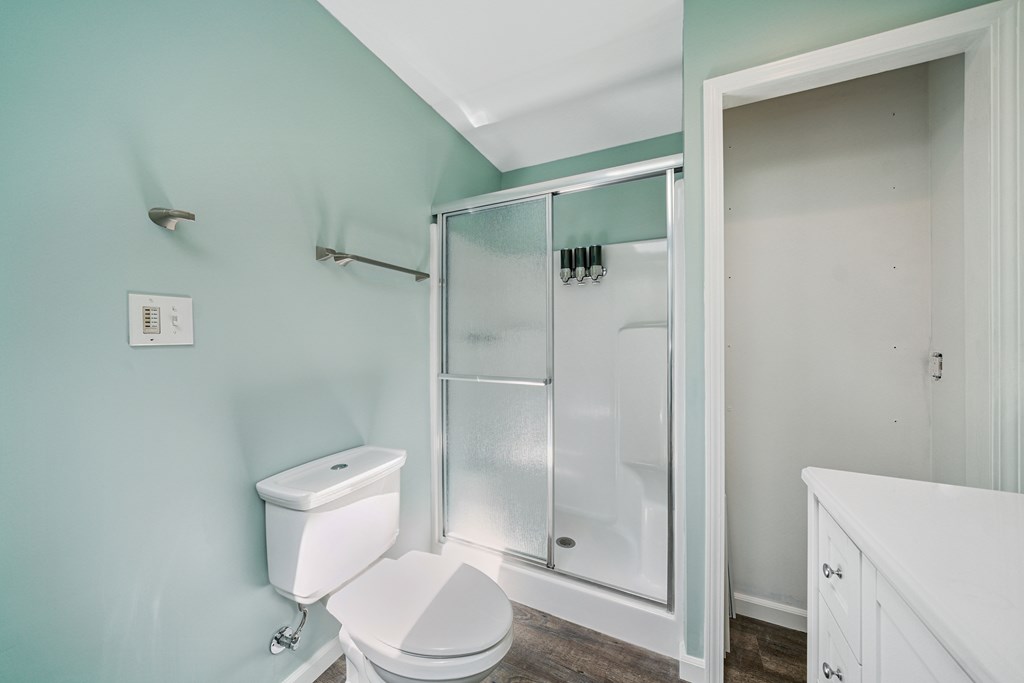 5055 Wright Bridge Road Cumming, GA 30028 - Photo 18 of 39 a white toilet sitting next to a bathroom