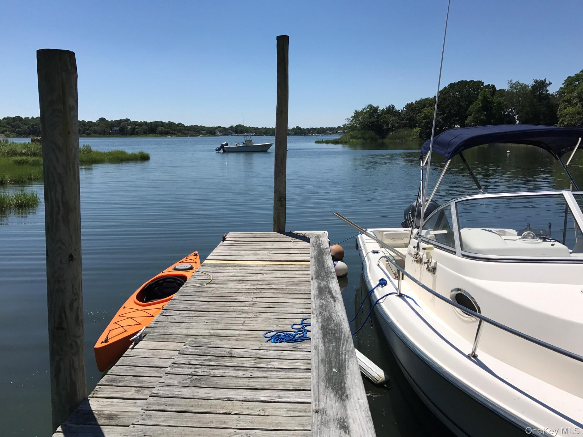 42 Towd Point Road Southampton, NY 11968 - Photo 19 of 26 a view of a lake from a balcony