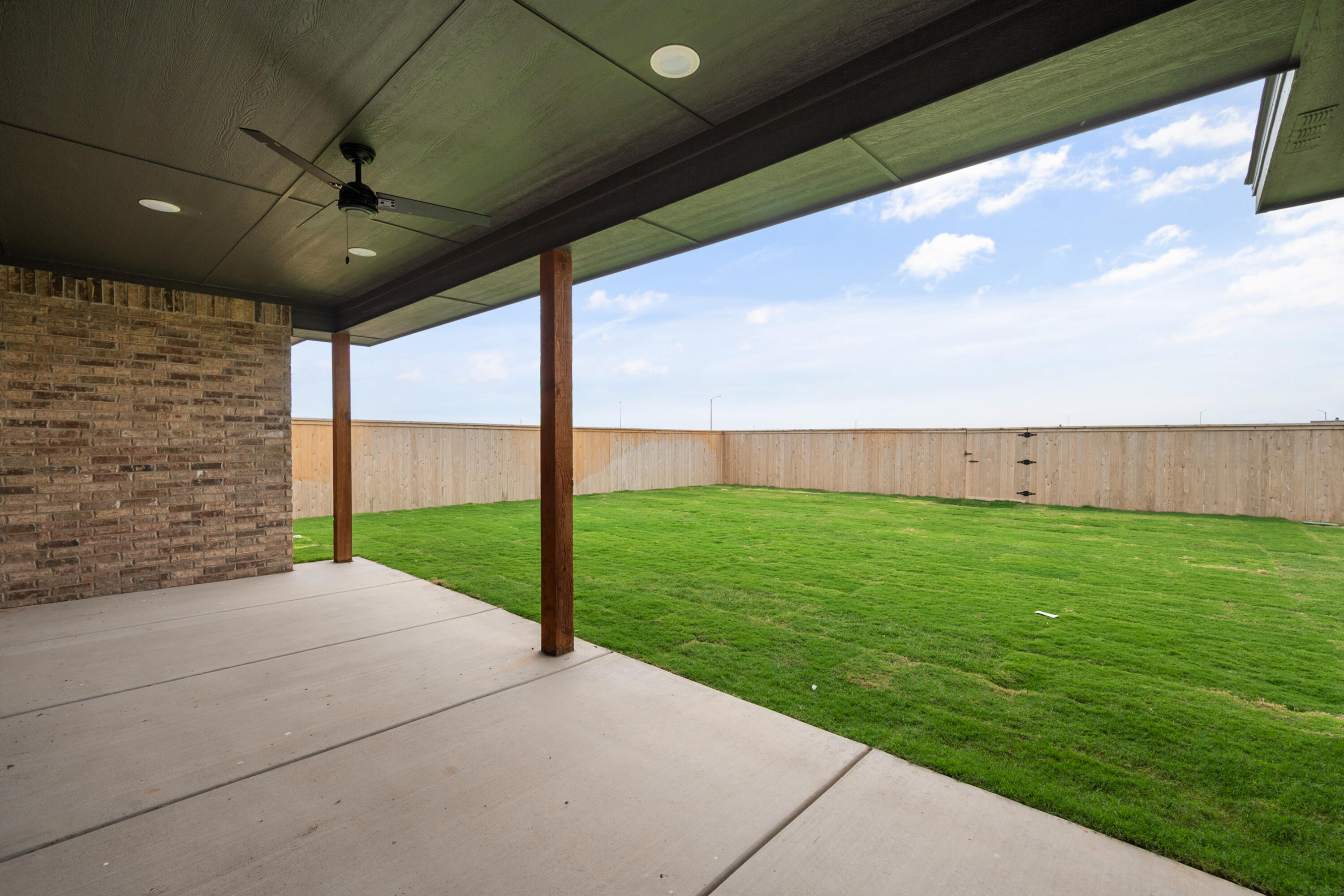 1005 North 5th Street Wolfforth, TX 79382 - Photo 34 of 36 a view of a back yard of the house