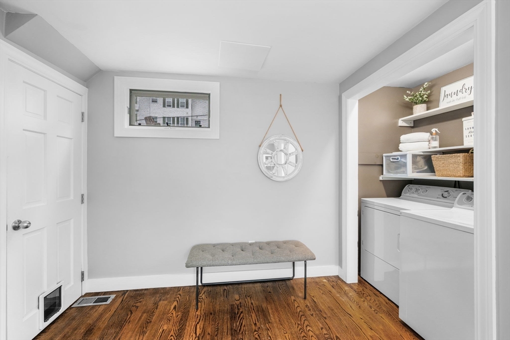 8 Baker Avenue Beverly, MA 01915 - Photo 8 of 40 a room with a table and a chair