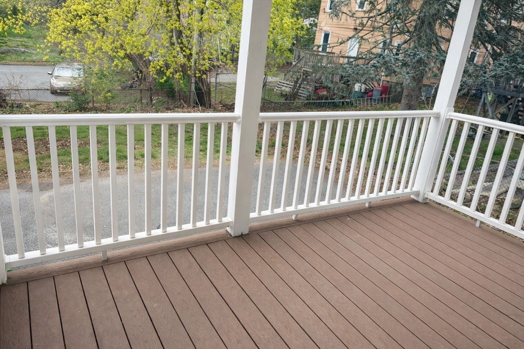 14 Walter Street, Unit 1 Boston, MA 02131 - Photo 12 of 14 a view of balcony with wooden floor