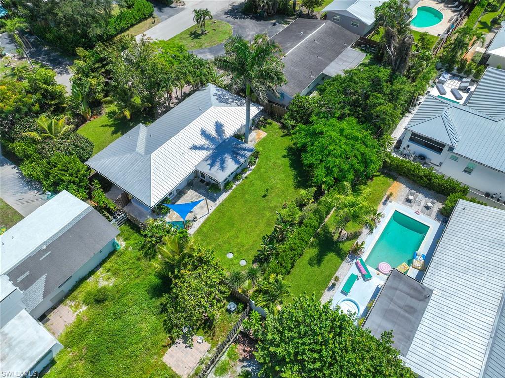 1304 Milano Drive Naples, FL 34103 - Photo 29 of 37 an aerial view of a house