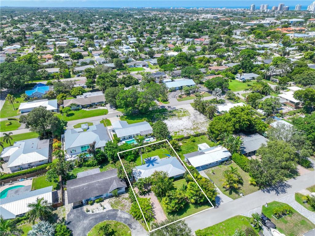 1304 Milano Drive Naples, FL 34103 - Photo 37 of 37 an aerial view of residential houses with outdoor space and street view