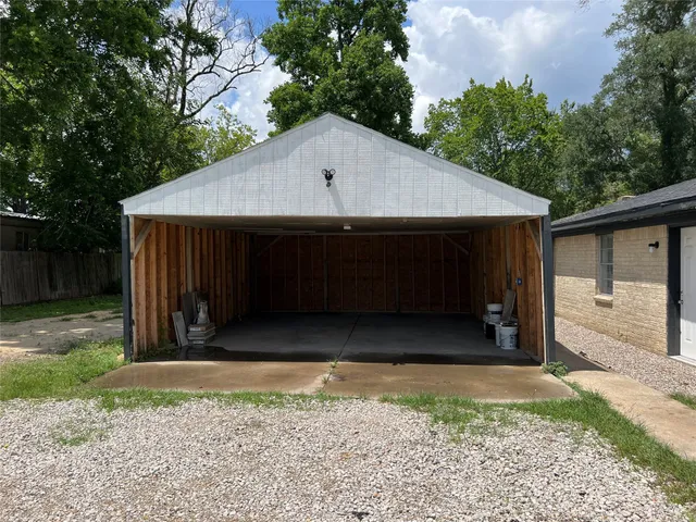 a house with trees in the background