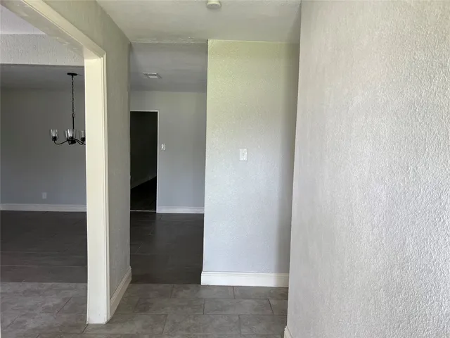 an empty room with an entrance