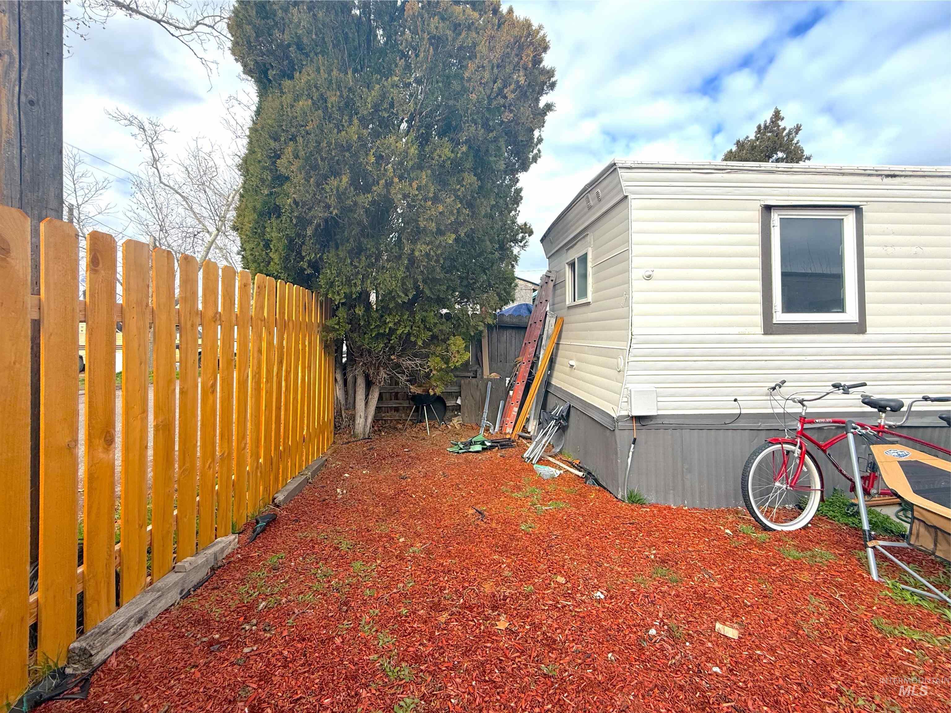 6728 West Fairview Avenue, Unit 24 Boise, ID 83704 - Photo 3 of 9 View of side of property