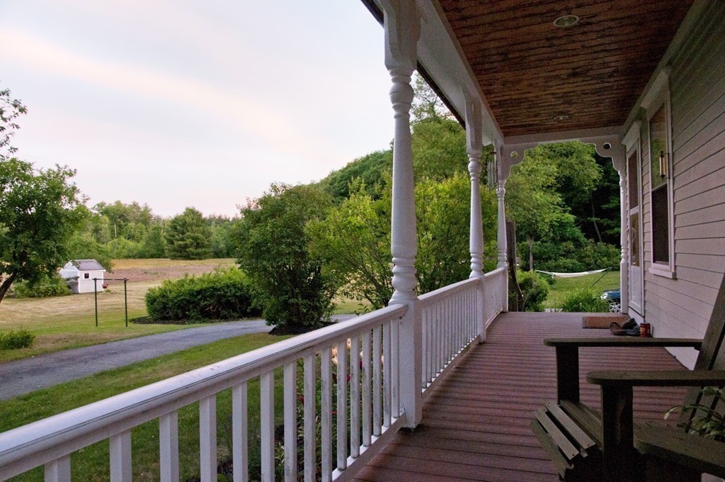 76 Randall Road Berlin, MA 01503 - Photo 1 of 29 a view of a patio with wooden floor