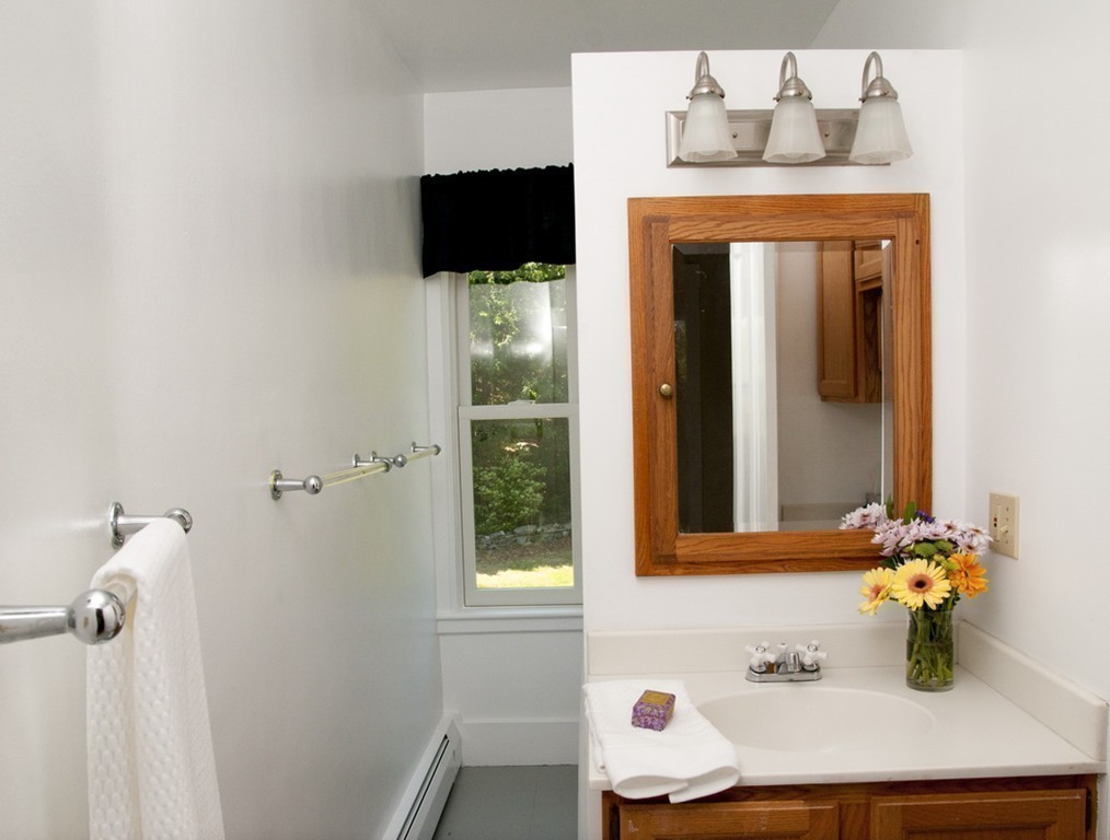 76 Randall Road Berlin, MA 01503 - Photo 16 of 29 a bathroom with a sink and a mirror