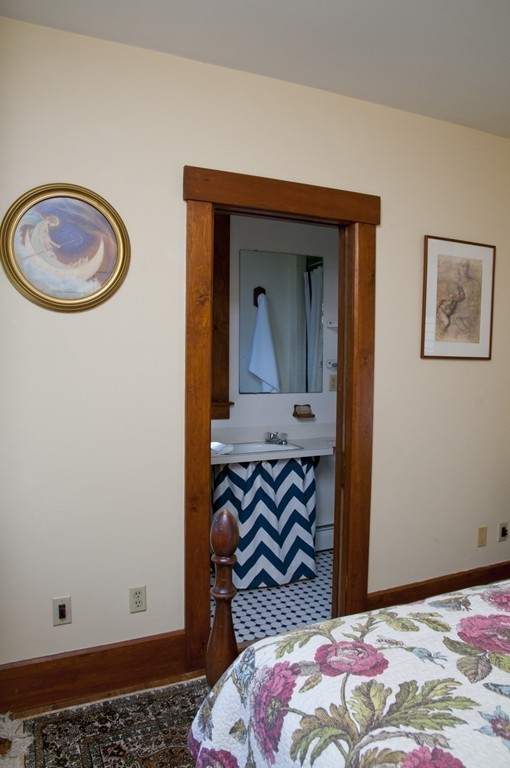 76 Randall Road Berlin, MA 01503 - Photo 19 of 29 a bedroom with a bed and a painting on the wall