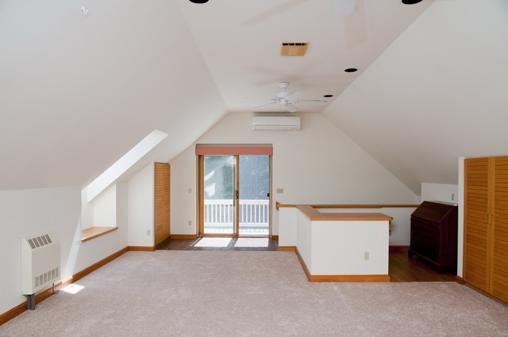 76 Randall Road Berlin, MA 01503 - Photo 25 of 29 wooden floor in an empty room with a window